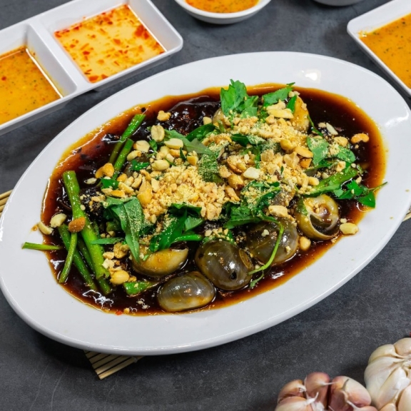 Ốc mỡ xào me